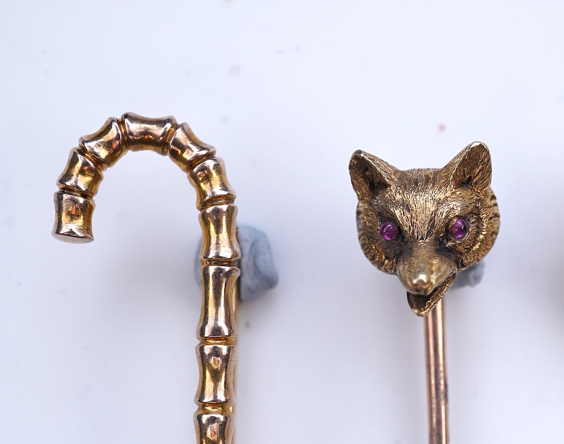 A collection of four tie pins, circa 1900